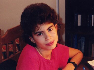 Photo of Maria Samurin as a Child at her Desk with a Funny Short Haircut